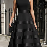 Elegant black sleeveless tiered midi evening dress