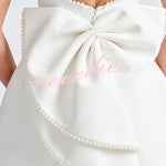 Stylish Pearl-embellished Large Bow Slim-fit Mini Dress