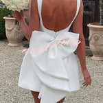 Stylish Pearl-embellished Large Bow Slim-fit Mini Dress