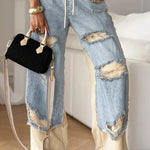 Women's Denim Trousers with Stitching and Ripped Design